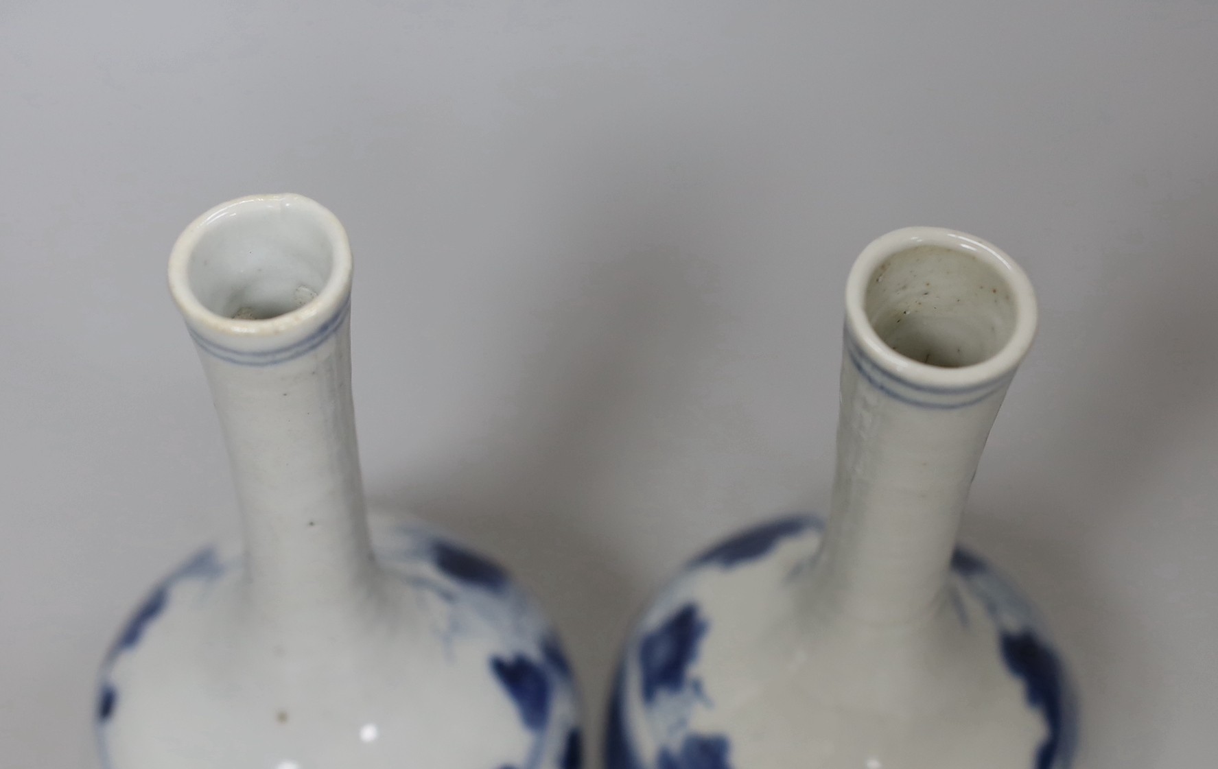 A pair of 19th century Chinese blue and white bottle vases, 16cm
